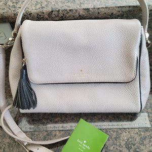Kate Spade Handbag - tan with a black tassel